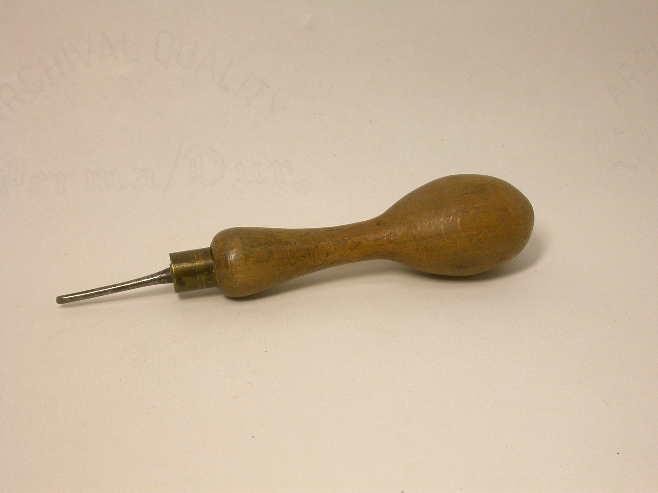 an%20awl%20with%20a%20knobbed%20wooden%20handle